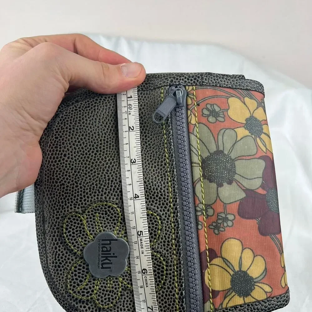 Haiku Sharon Eisenhauer Brown and yellow floral crossbody bag